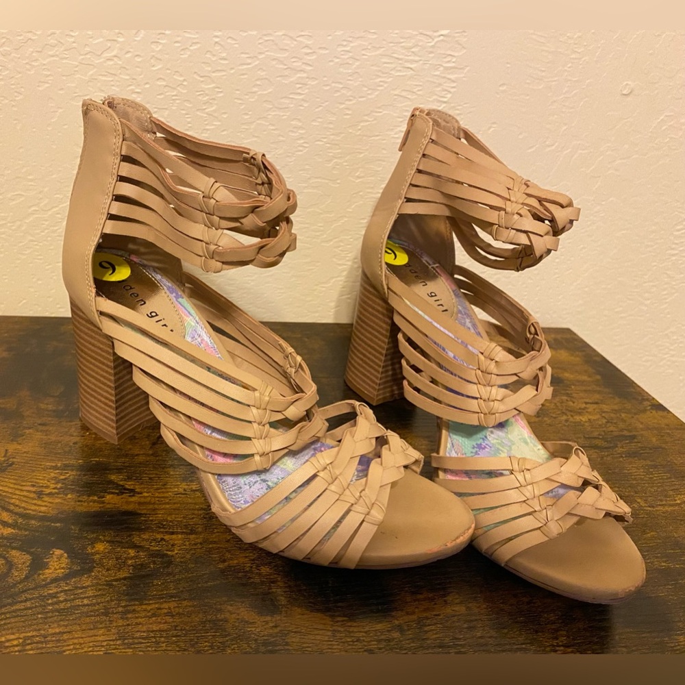 High heel shoes with zipper in back.